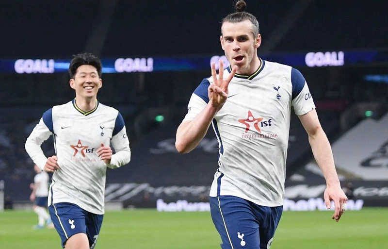 Gareth Bale ăn mừng khi hoàn tất hat-trick. Ảnh: Getty Images 