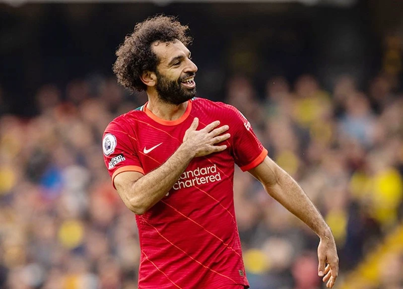 Mohamed Salah đã thay đổi ý định rời sân Anfield. Ảnh: Getty Images