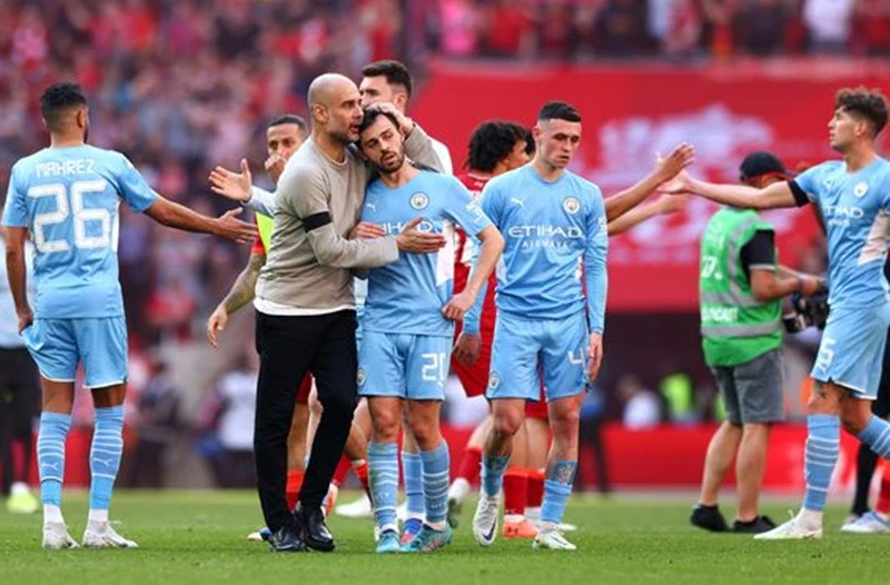HLV Pep Guardiola khẳng định tâm lý của cầu thủ vẫn tốt. Ảnh: Getty Images
