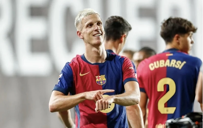 Dani Olmo ra mắt bằng bàn thắng quyết định vào phút chót giúp Barcelona thắng 2-1 tại Rayo Vallecano.