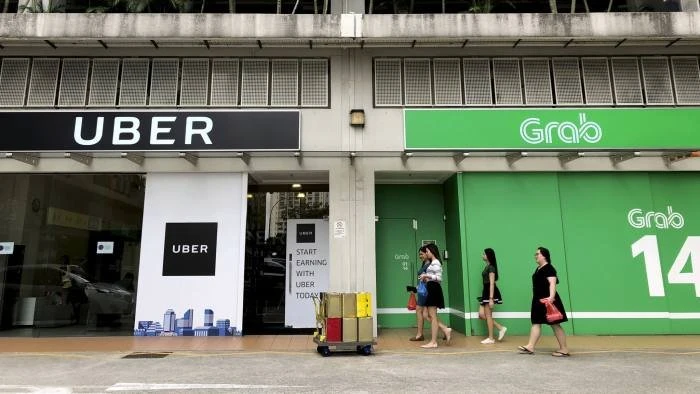 Uber sẽ có 27,5% cổ phần sau sáp nhập vào Grab. Nguồn: AP