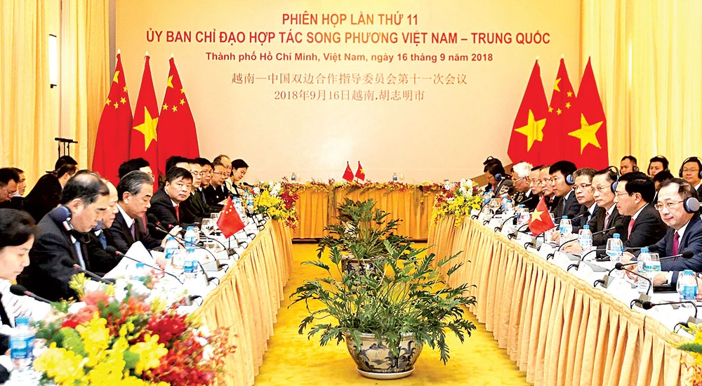 Đồng chí Phạm Bình Minh, Ủy viên Bộ Chính trị, Phó Thủ tướng Chính phủ, Bộ trưởng Bộ Ngoại giao và Ủy viên Quốc vụ, Bộ trưởng Bộ Ngoại giao Trung Quốc Vương Nghị đồng chủ trì Phiên họp lần thứ 11 Ủy ban Chỉ đạo hợp tác song phương Việt Nam - Trung Quốc. 