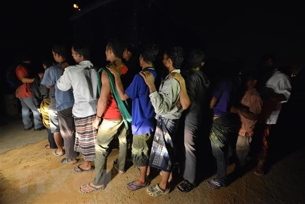 Lao động nhập cư bất hợp pháp bị bắt giữ tại Klang, ngoại ô Kuala Lumpur, Malaysia. Nguồn: TTXVN