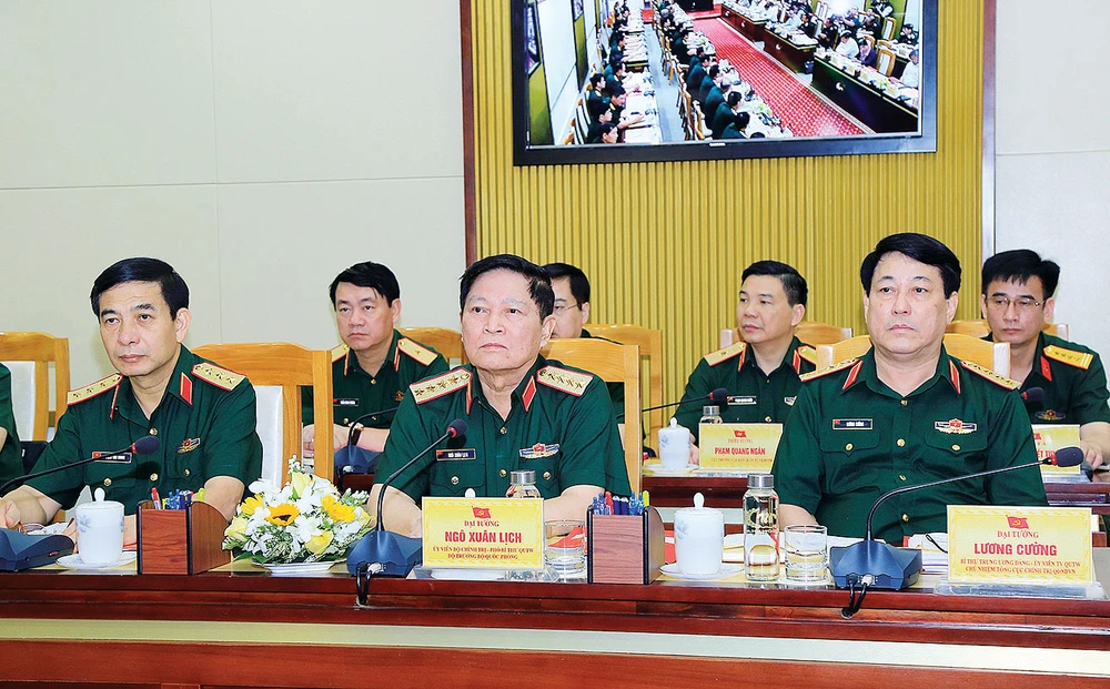 Đại tướng Ngô Xuân Lịch, Ủy viên Bộ Chính trị, Phó Bí thư Quân ủy Trung ương, Bộ trưởng Bộ Quốc phòng (giữa), chủ trì hội nghị. Ảnh: TTXVN
