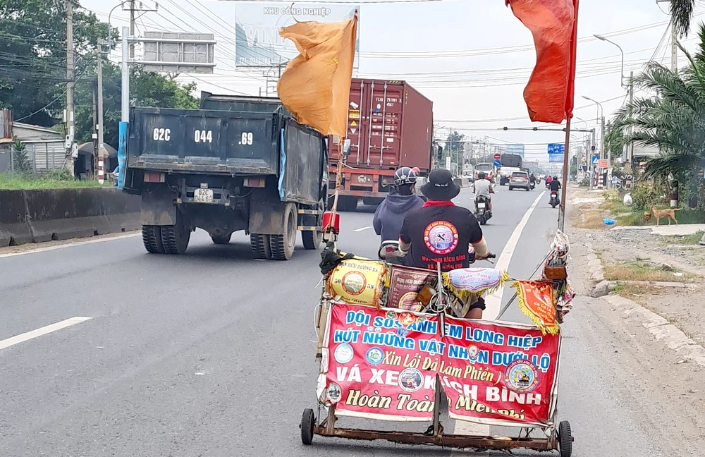 Hút đinh, kích bình, vá xe miễn phí