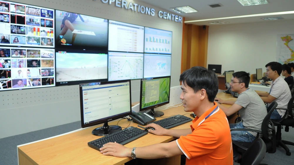 Hoạt động tại doanh nghiệp công nghệ thông tin, viễn thông trong KCX Tân Thuận. Ảnh: THÀNH TRÍ