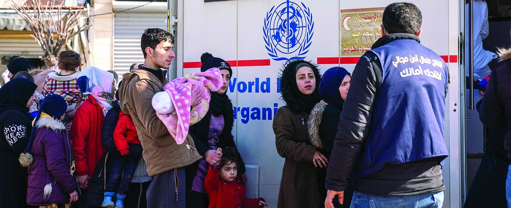 Nhân viên Liên hợp quốc hỗ trợ nhu yếu phẩm cho người dân Syria