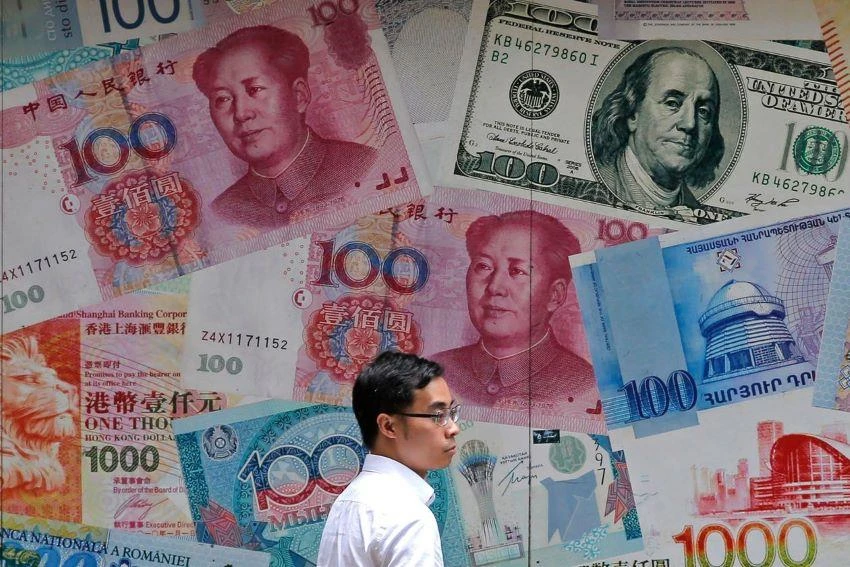 A weaker yuan makes Chinese goods more competitive abroad, and makes U.S. products and other imports into China more expensive. PHOTO: KIN CHEUNG/ASSOCIATED PRESS