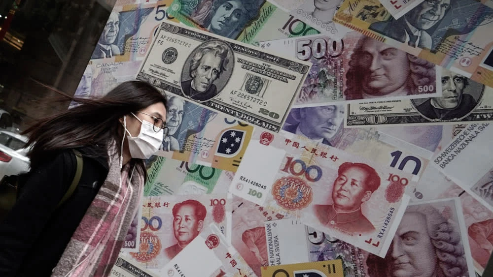 Emerging Asian currencies have nosedived against the dollar during the coronavirus crisis at investors seek the haven of the greenback. © AP
