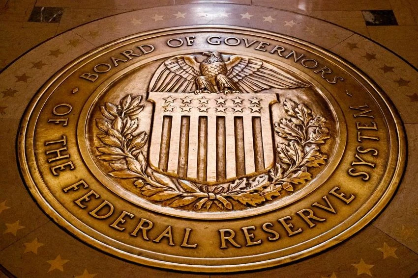 The central bank signaled it would do practically anything to help an American economy in a race against time. PHOTO: ANDREW HARNIK/ASSOCIATED PRESS