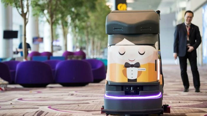 An automated robotic cleaner at Changi Airport in Singapore. The city-state leads south-east Asia in AI adoption, and hospitality is a key sector for the technology © Bloomberg