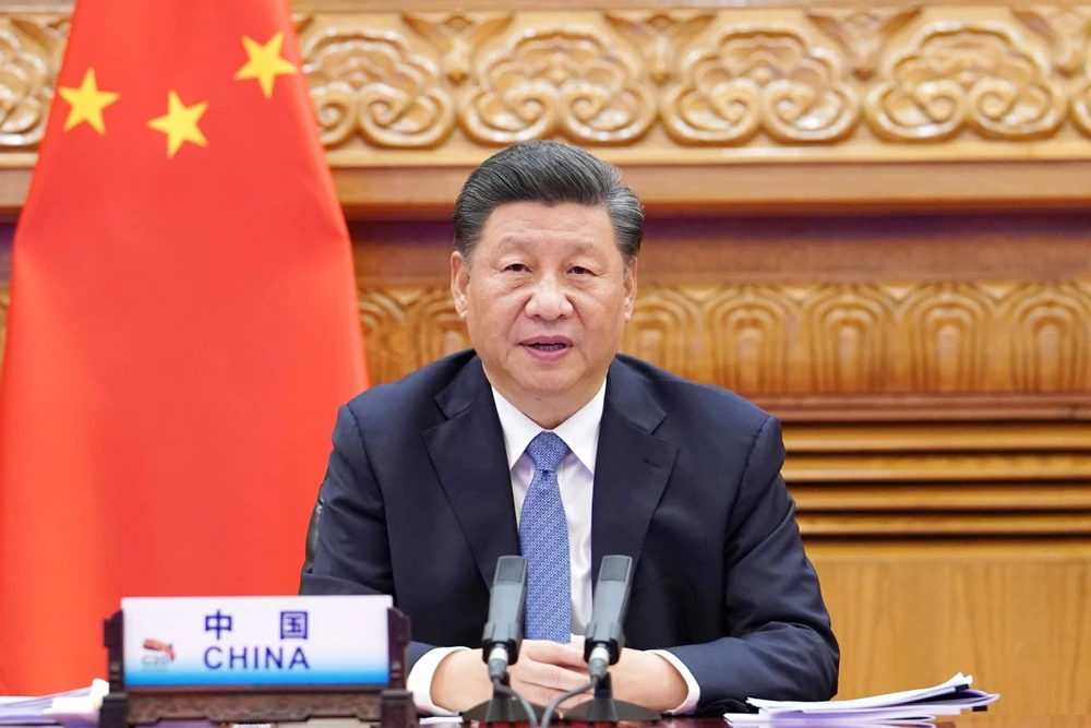  Chủ tịch Trung Quốc Tập Cận Bình tham dự hội nghị thượng đỉnh G20 qua liên kết video ở Bắc Kinh hôm 21-11. Ảnh: Xinhua