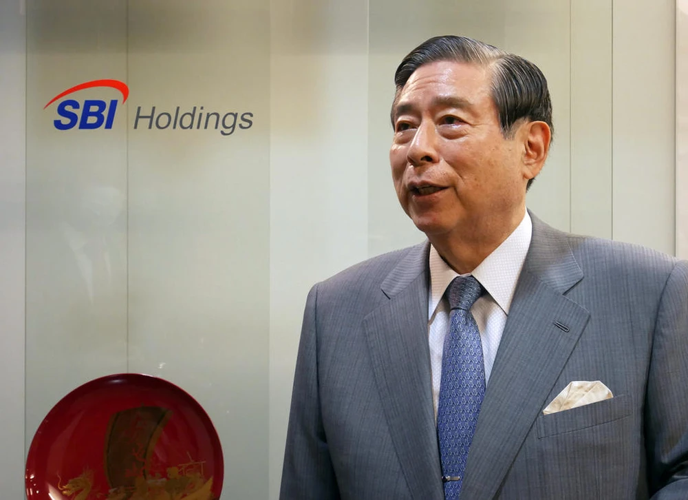 Giám đốc điều hành Yoshitaka Kitao của tập đoàn tài chính SBI Holdings. Ảnh: Reuters