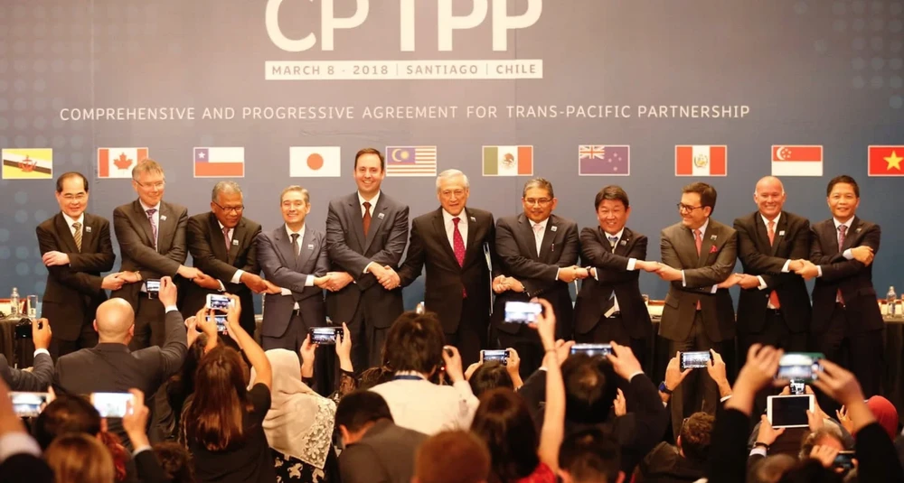  Vào 8-3-2018, các bộ trưởng thương mại từ 11 quốc gia đã tập trung tại Santiago, Chile để ký thoả thuận CPTPP. Ảnh: Reuters