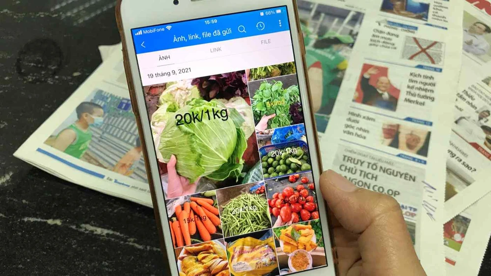 Instead of braving the outside world, more Vietnamese consumers are buying food and other necessities from neighbors via social media. (Photo by Tomoya Onishi)