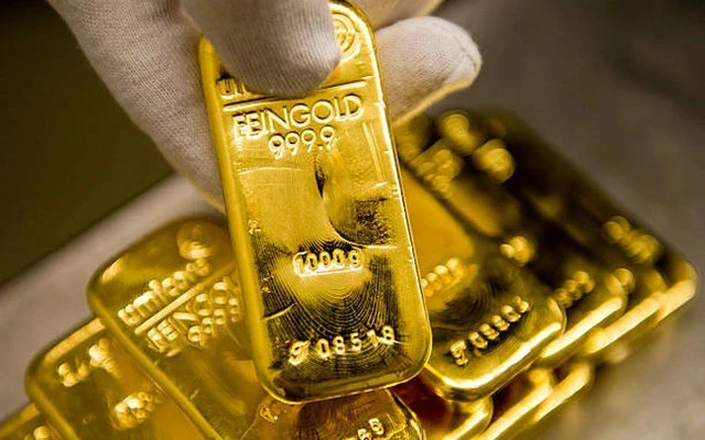 Giá vàng 5/12: Vàng vọt lên mức cao kỷ lục mới 2.152 USD/ounce rồi chững lại