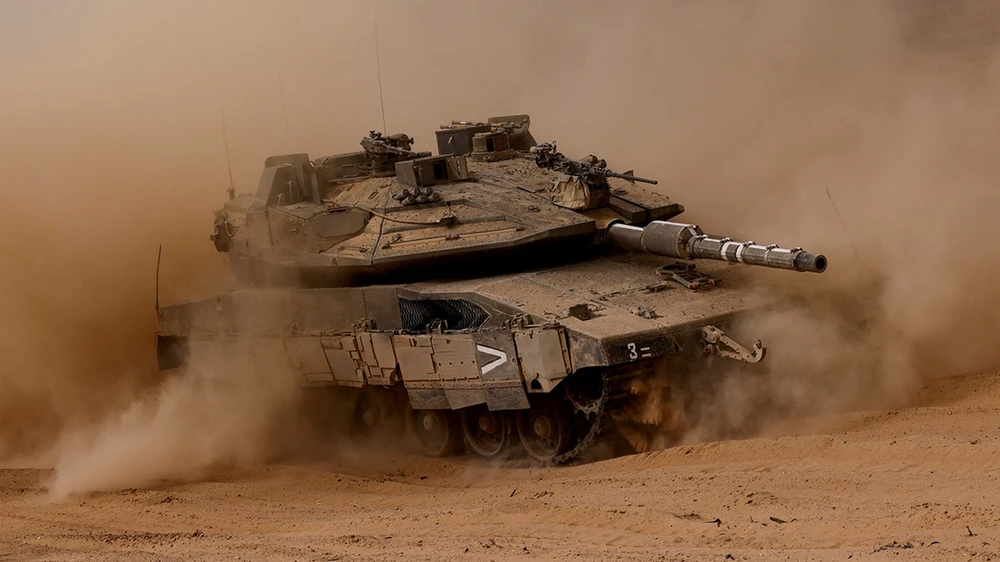 Một cuộc diễn tập xe tăng gần biên giới Israel-Gaza, trong bối cảnh xung đột đang diễn ra giữa Israel và Hamas, ngày 27/5 (REUTERS/Amir Cohen)