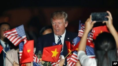 U.S. President Donald Trump arrives aboard Air Force One at Noi Bai International Airport in Hanoi, Vietnam November 11, 2017.