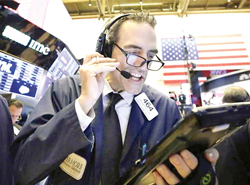 Thị trường chứng khoán New York đón nhận tin vui của các cổ phiếu công nghệ 