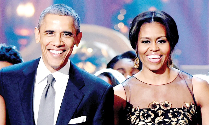Vợ chồng ông Obama được người Mỹ ngưỡng mộ nhất năm