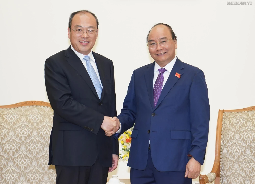 Thủ tướng Nguyễn Xuân Phúc và Tỉnh trưởng Vân Nam, Trung Quốc Nguyễn Thành Phát. Ảnh: VGP