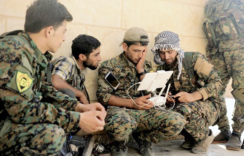 Các tay súng sẽ được đào tạo lại để gia nhập SDF