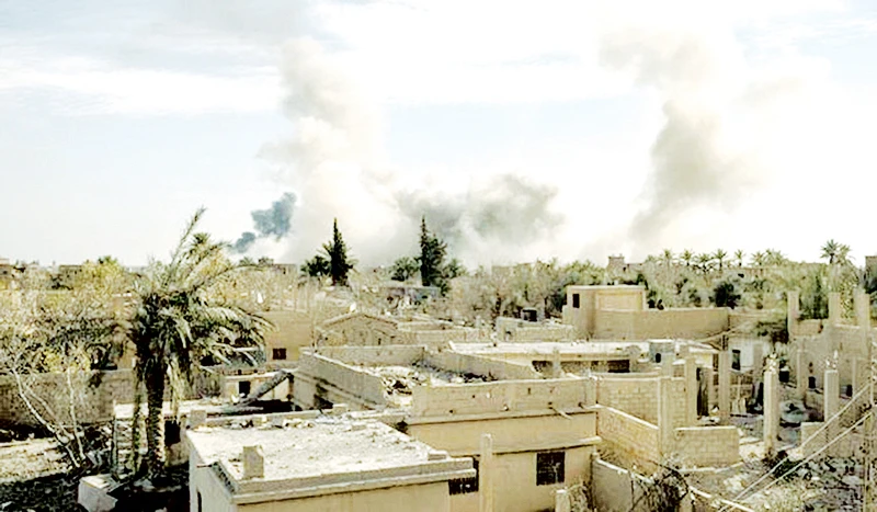 Liên quân không kích thị trấn Susa, một trong những hang ổ cuối cùng của IS ở Syria. Ảnh: CNN