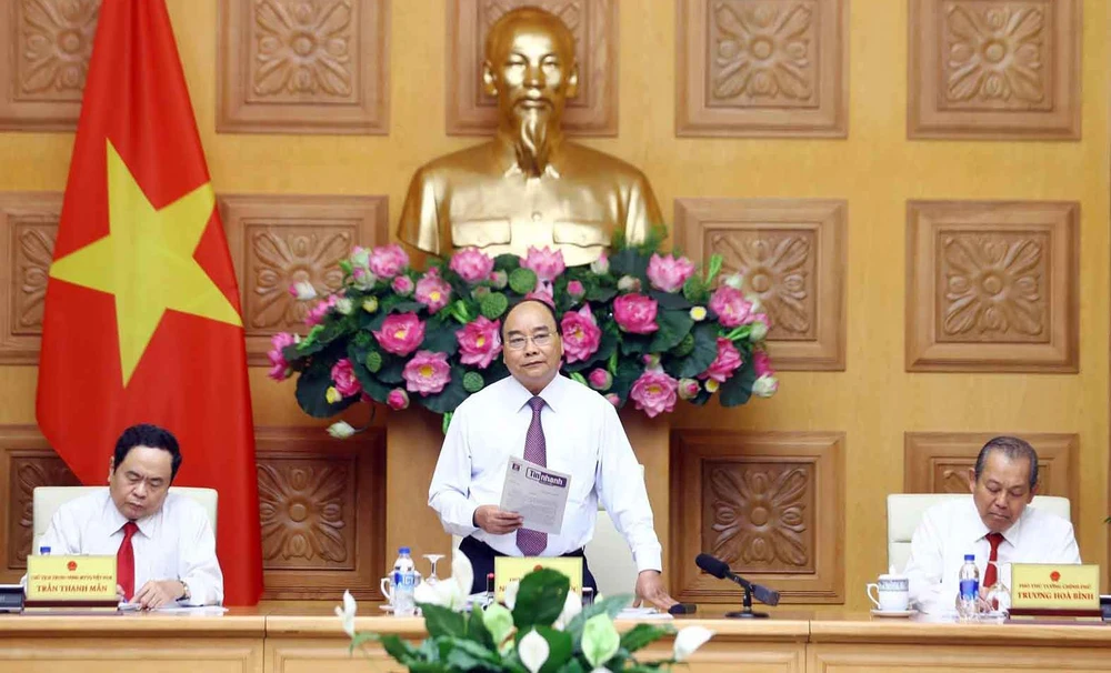 Thủ tướng Nguyễn Xuân Phúc phát biểu tại Hội nghị liên tịch thường niên giữa Chính phủ và Ủy ban Trung ương Mặt trận Tổ quốc Việt Nam. Ảnh: TTXVN