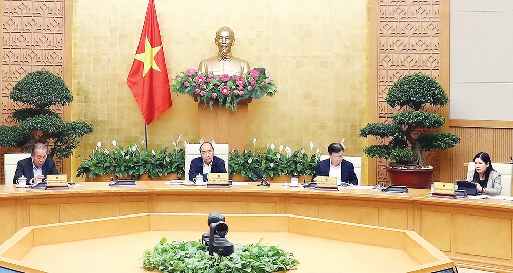 Thủ tướng Nguyễn Xuân Phúc chủ trì phiên họp Thường trực Chính phủ về giải pháp bình ổn giá thịt heo. Ảnh: TTXVN