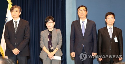 (From left) Cho Kuk, Cho Hyun-ock, Yoon Young-chan and Lee Joung-do stand before reporters at Cheong Wa Dae in Seoul on May 11, 2017. (Yonhap)
