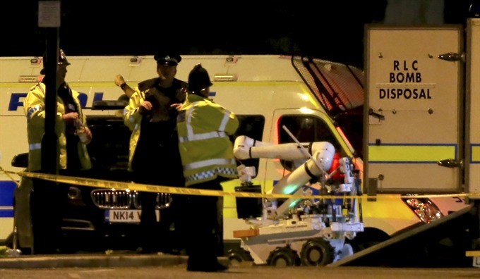 A Royal Logistic Corps (RLC) bomb disposal robot is unloaded outside the Manchester Arena following reports of an explosion, in Manchester, Britain, on Tuesday. - EPA/VNA