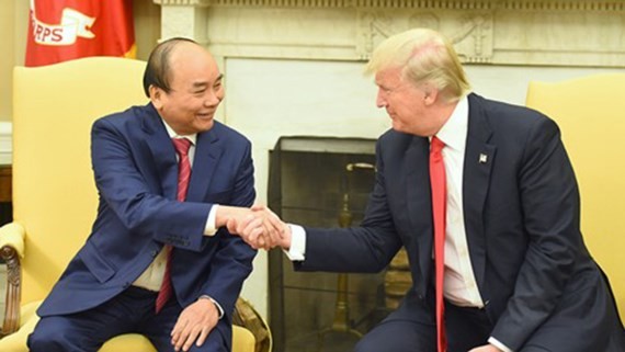 Vietnamese Prime Minister Nguyen Xuan Phuc (left) and US President Donald Trump.