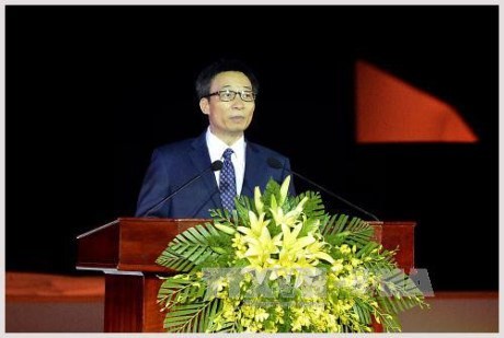 Deputy Prime Minister Vu Duc Dam speaks at the opening ceremony 