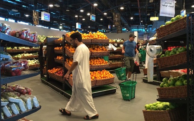Customers are seen shopping at the al-Meera market in the Qatari capital Doha, on June 10, 2017.