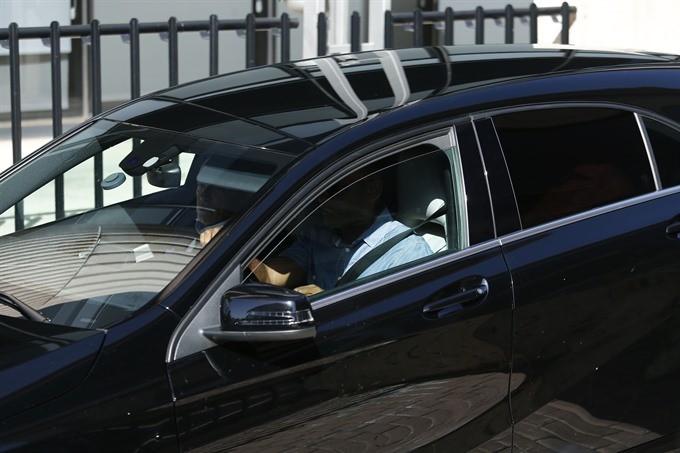 Unseen Real Madrid’s Portuguese forward Cristiano Ronaldo arrives in a vehicle with tinted windows to appear at a court in Pozuelo de Alarcon, a wealthy suburb of Madrid on July 31, to answer on four counts of tax evasion of 14.7 million euros ($16.5 mill