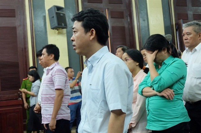 Defendants at the court hearing. — Photo plo.vn