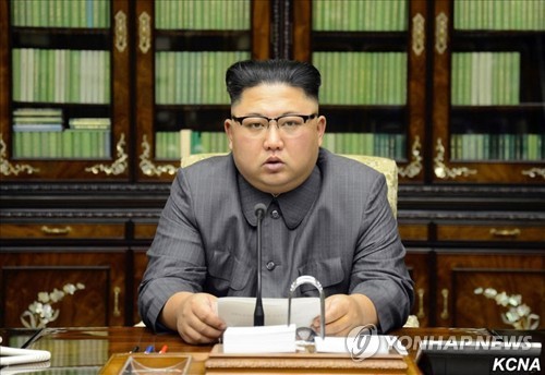This photo carried by North Korea's state news agency on Sept. 22, 2017 shows North Korean leader Kim Jong-un reading his statement condemning U.S. President Donald Trump for threatening to "totally destroy" the North. (For Use Only in the Republic of Kor