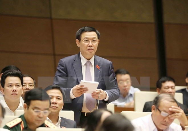 Deputy Prime Minister Vuong Dinh Hue speaks at the hearing session of the 14th National Assembly’s fourth sitting (Source: VNA)