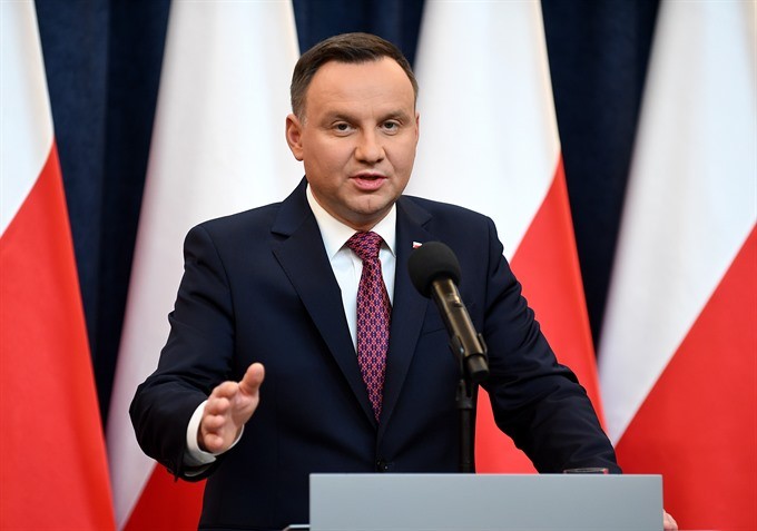 Poland’s President Andrzej Duda delivers a statement on Wednesday in Warsaw, where he announced that he signed into law two controversial judicial reforms that opposition politicians and the EU insist they undermine the rule of law and the separation of p