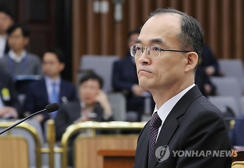 Prosecutor-General Moon Moo-il attends a parliamentary session of a special committee on prosecution reform at the National Assembly on March 13, 2018. (Yonhap)