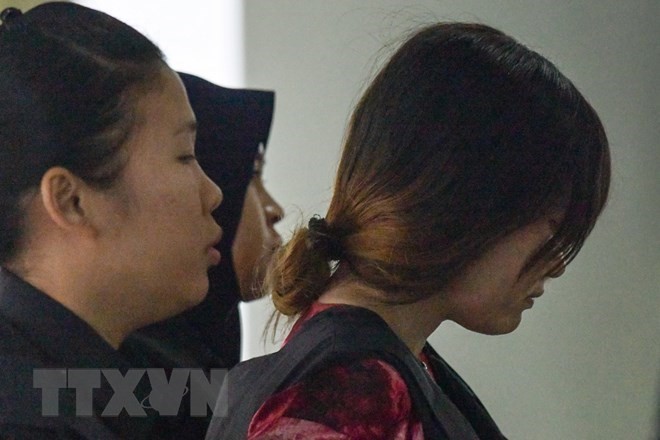 Vietnamese suspect Doan Thi Huong is led to the court in Shah Alam on the outskirts of Kuala Lumpur on January 22 (Photo: AFP/VNA)