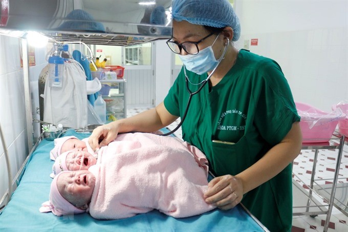 A woman gave birth to triplets---all girls---in a rare case. The babies are in good health. — VNA/VNS Photo Thanh Sang 
