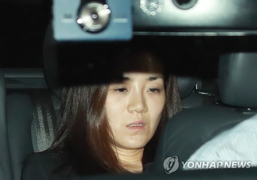 The photo, filed May 2, 2018, captures Cho Hyun-min, an heiress to Korean Air Lines Co., inside a car on her way back from the Seoul Gangseo Police Station after undergoing a police questioning over assault allegations. (Yonhap)