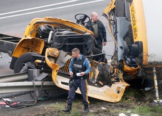 US school bus crash: one student, one teacher killed
