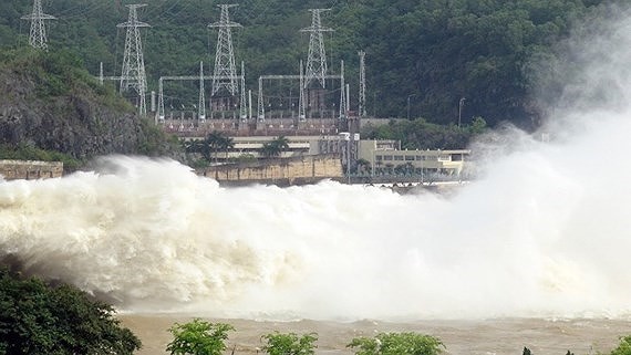 Hoa Binh & Son La hydropower plants open floodgates Photo: SGGP