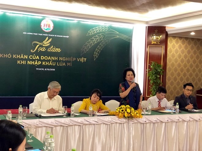 Ly Kim Chi, Chairwoman of the HCM City Food and Foodstuffs Association, speaks at the seminar held by the association to discuss difficulties faced by businesses when importing wheat.(Photo: VNA)