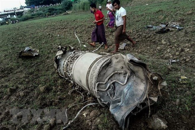 The scene of the military jet fighters crash in the central Magway region, Myanmar, on October 16 (Photo: AFP/VNA)