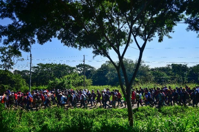 Honduran migrants march as Trump vows 'full efforts' to halt them 