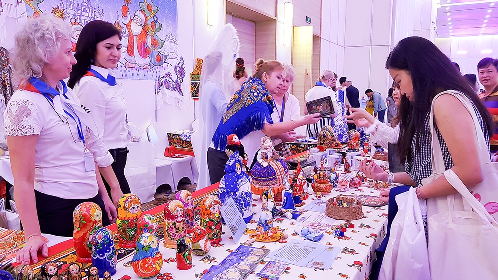 Visitors buy Russian traditional products at The Russian Consulate General in HCMC's booth