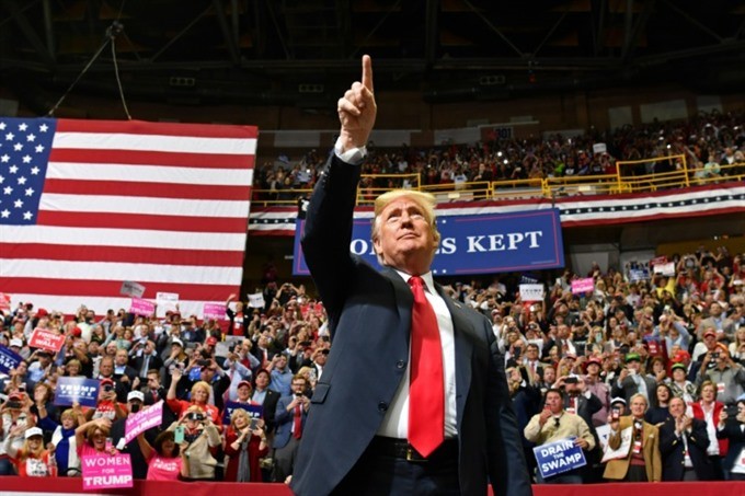 In a hard-driving series of rallies around the country, President Donald Trump has put himself at the centre of the US midterm campaign. — AFP/VNS